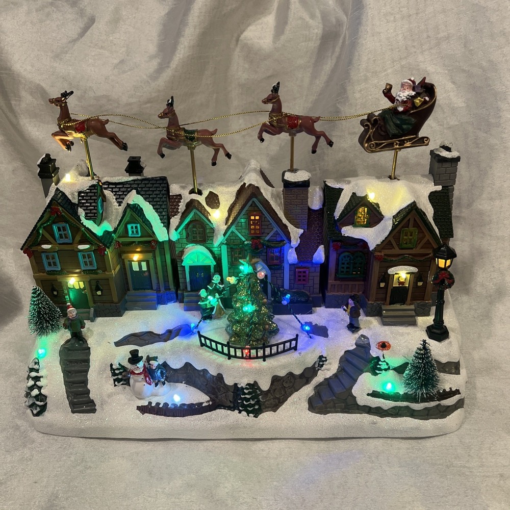 Musical Village Christmas Moving‎ Santa Sleigh Reindeer - Buildings Lights  Tree